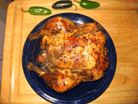whole chicken - cooked with dry rub on grill with jalapeno peppers